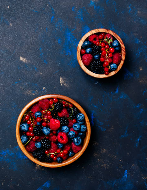 istock Summer berries in assortment, food background 969408182