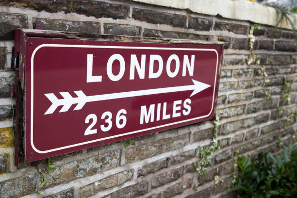 Footpath Sign to Hyde Park Corner in City of Westminster, London. It also shows the way to Trafalgar Square, Charing Cross and Westminster, with the Royal Parks symbol at the top