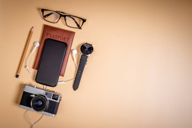istock Luxury Travel accessories on brown copy space 969425192