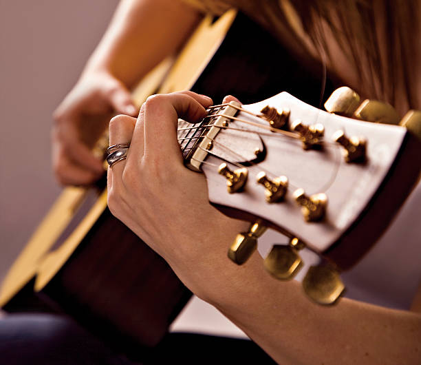 Strumming my guitar stock photo