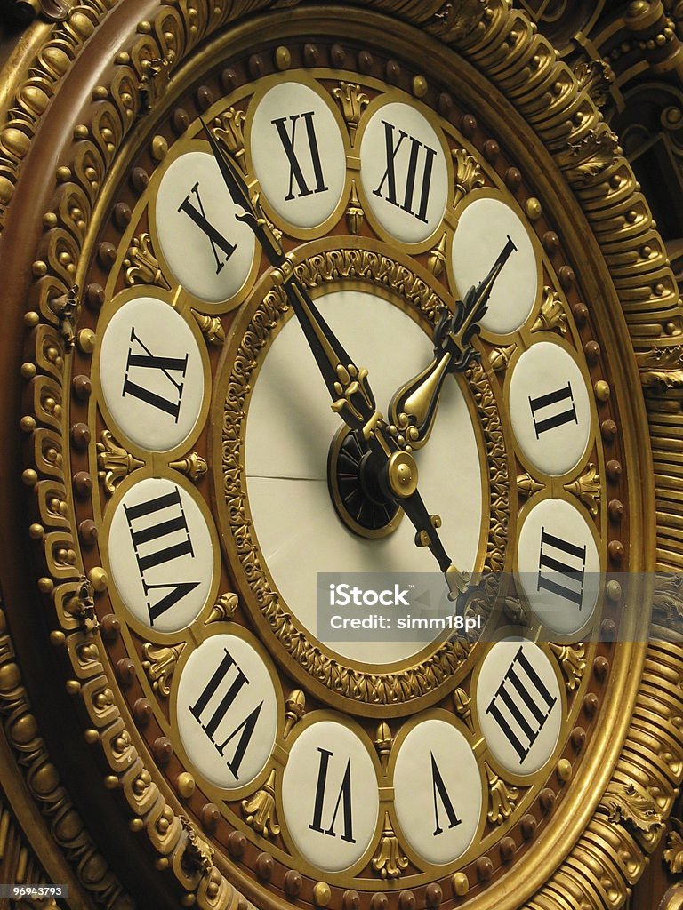big gold clock from Musée d'Orsay in Paris  12 O'Clock Stock Photo