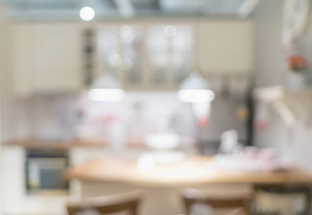 istock Blurred background modern kitchen and dinning room in house with bokeh light.lifestyle backdrop. 969438208