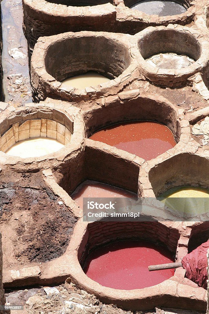 tanks in Moroccan tannery  Arabic Script Stock Photo