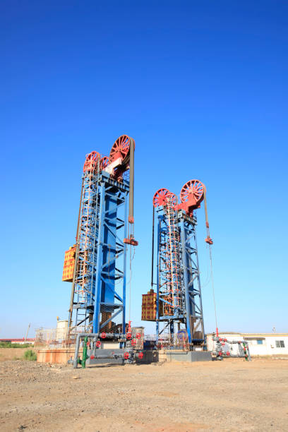 istock Oil field scene,Tower type pumping unit under the blue sky 969438730