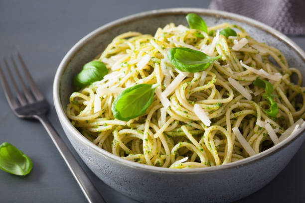 istock spaghetti pasta with avocado basil pesto sauce 969442388