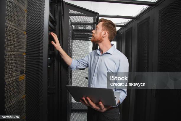 Skillful It Technician Establishing Connection Stock Photo - Download Image Now - Accessibility, Adult, Binary Code