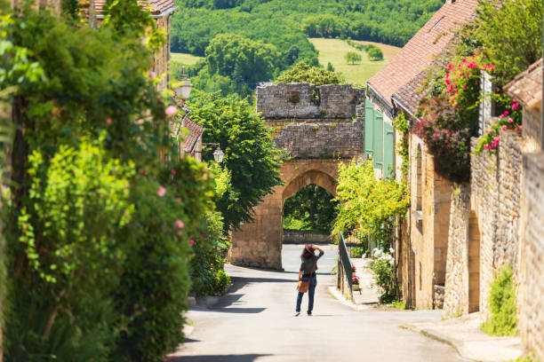 Old street of Domme village in Dordogne department, France stock photo