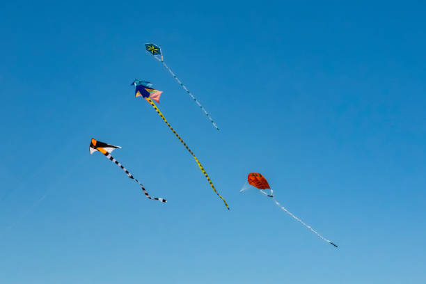 istock colorful kites in the blue sky 969453362