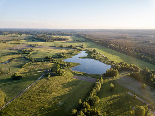 istock drone image. aerial view of rural area with fields and roads 969461038
