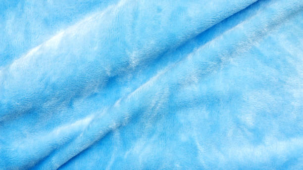 istock Close up of blue soft fabric for a background. 969461610