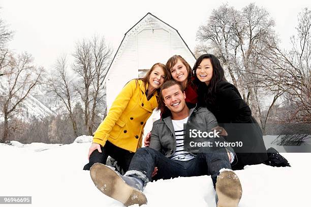Young Friends Having Fun In Winter Stock Photo - Download Image Now - February, Friendship, Multiracial Group