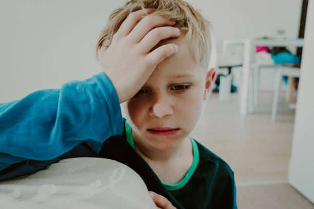 istock sad child, stress and depression at home 969484386