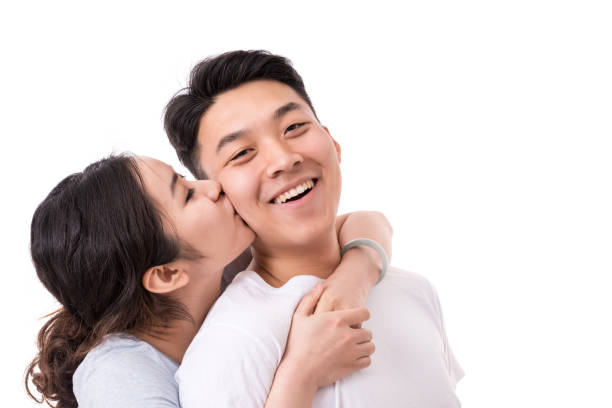 Kiss On the Cheek. Woman kissing man on cheek.