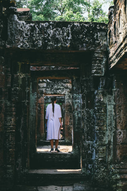 istock Woman exploring Angkor in Cambodia 969489058