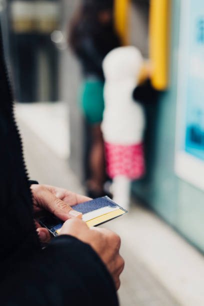 istock man about to withdraw money from an ATM 969496210