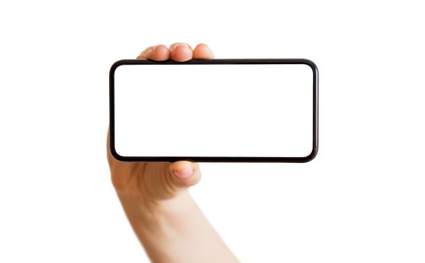 istock Person holding phone with empty white screen horizontally. Mobile app mockup. 969497392