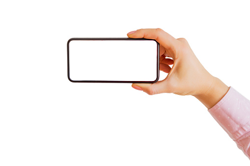 Person holding smartphone horizontally in one hand. Mobile app mockup for your design.