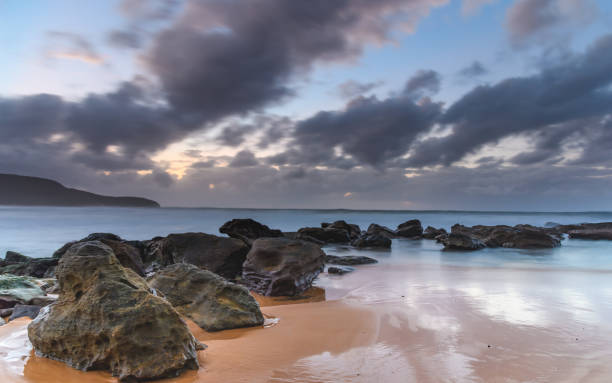 istock Rocky Seascape with Clouds 969501226