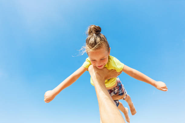 istock Flying boy like super hero 969507130