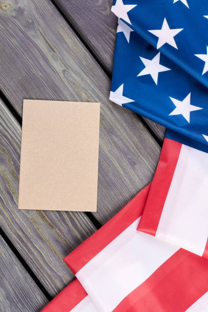 istock USA flag and craft envelope, top view. 969507866