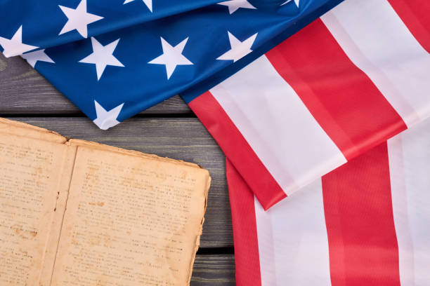 istock Close up American flag and Bible. 969510052