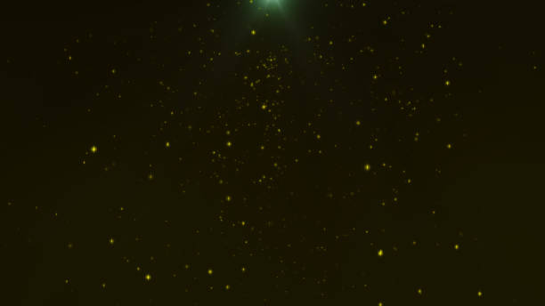 istock background flying light purple or pink particles in light beams. 969510226