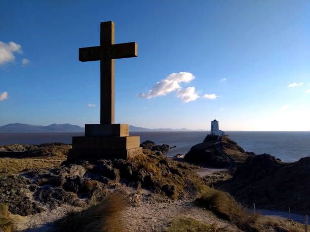 istock Saint Dwynwen's Cross and Llanddwyn Island Lighthouse 969512030