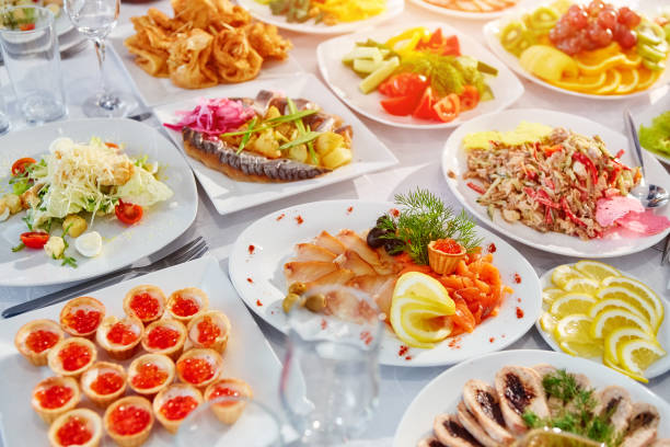 istock Table with food and drinks in a restaurant 969514454