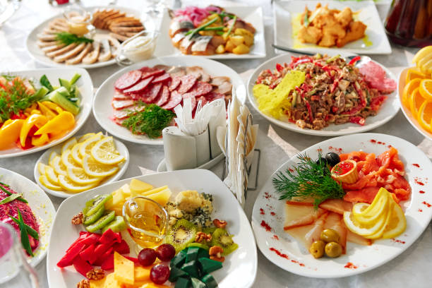 istock Table with food and drinks in a restaurant 969514482