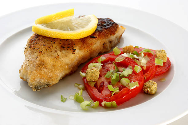 istock grilled carp fillet with organic vegetable on a plate 96951542