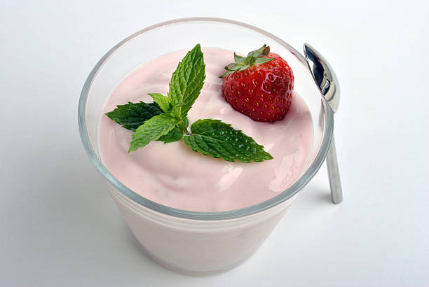 istock one organic strawberry in yogurt and mint 96951683