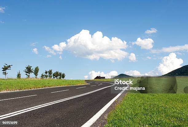 Rendered Graphic Of New Road Traversing A Green Field Stock Photo - Download Image Now