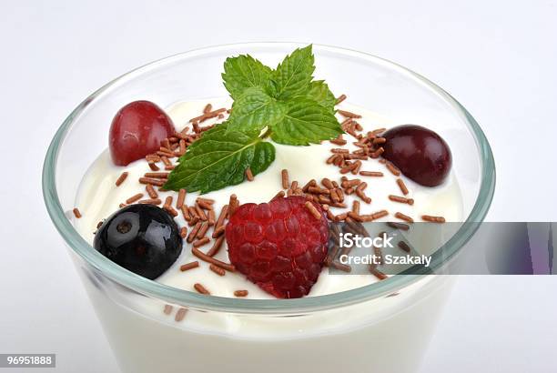 Some Organic Blackberries In Natural Yoghurt And Mint Stock Photo - Download Image Now