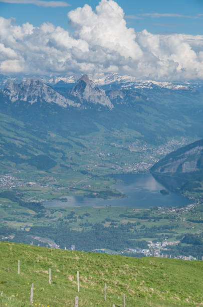 istock Lake surrounded by mountains and villages 969519938