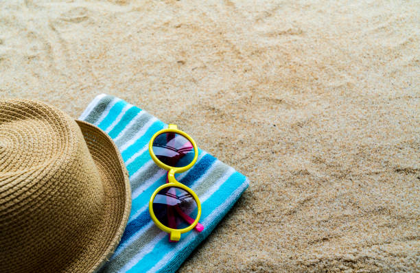 istock Beach Accessories On Table On Beach - Summer Holidays 969528038