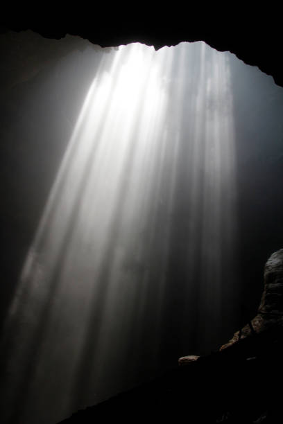 istock Sunlight through the cave hole at Jomblang cave 969528394