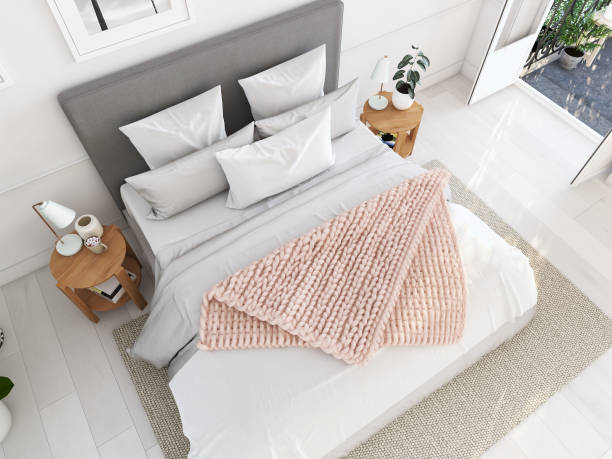 istock new modern bedroom in a apartment. 3d rendering 969534848