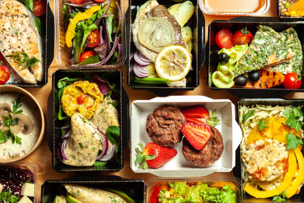 istock A lot of cardboard boxes with food 969535396