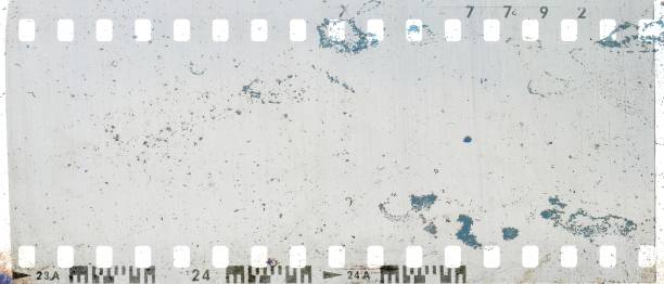 istock Vintage gray film strip frame scratched textured. 969535684