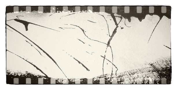 istock Grunge dripping film strip frame in black and white tones. 969538166