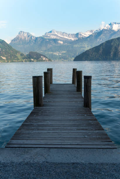 istock Pier jutting out into an alpine lake 969539478