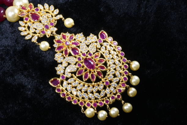 istock fancy and colorful Pendant macro image on black background 969547260