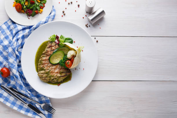 istock Appetizing grilled beefsteak and healthy vegetable salad 969549432