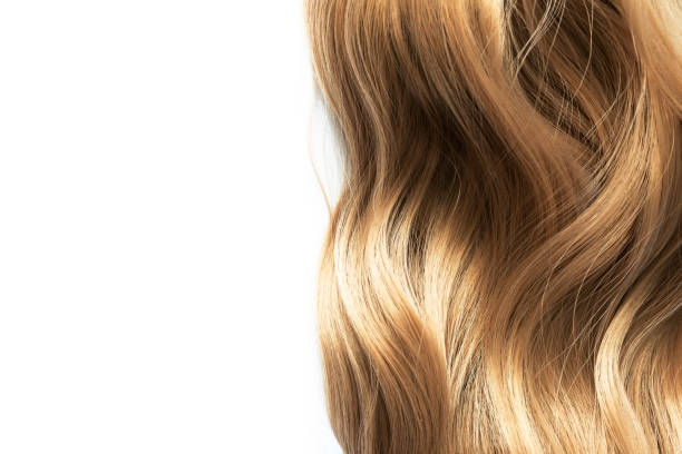 long blond wavy hair on white background