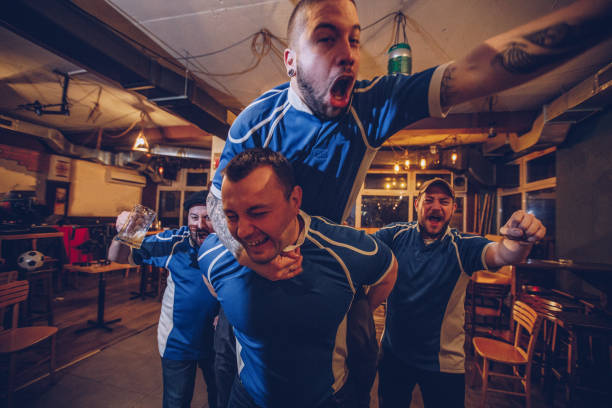 istock Cheerful sport fans 969549616