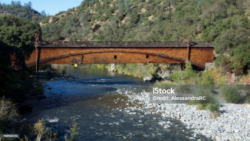 Bridgeport Covered Bridge Side view of the bridgeport Covered Bridge at South Yuba River in California, USA. This bridge has the longest clear span of any surviving covered bridge in the world River Stock Photo