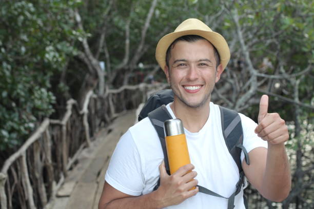 istock Adventurous ethnic explorer giving a thumbs up 969555298