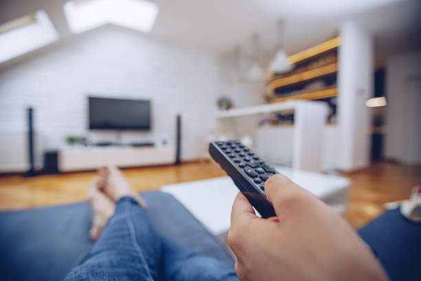 istock Watching TV at home 969556666
