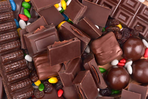 istock chocolate candy and dark chocolate on the table 969559832