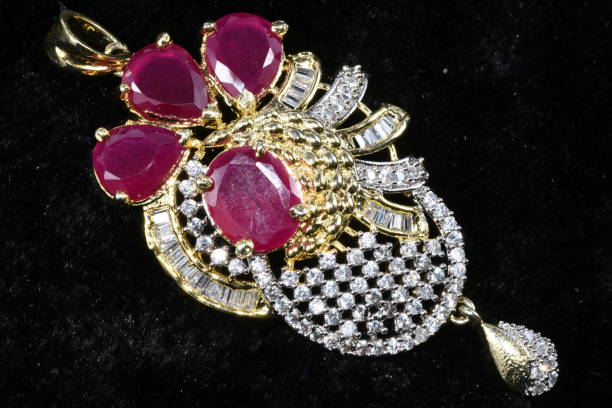 istock fancy and colorful American Diamond Pendant macro image on black background 969560454